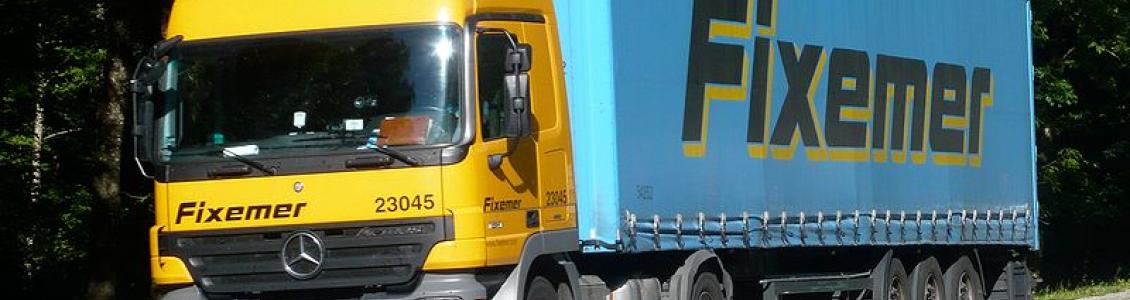 heavy good vehicle or lorry carries cargo to freight ferry