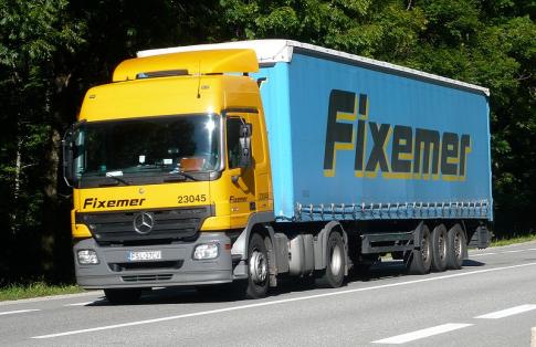 heavy good vehicle or lorry carries cargo to freight ferry