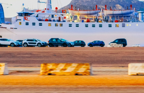 Olbia port showing ferry and cars
